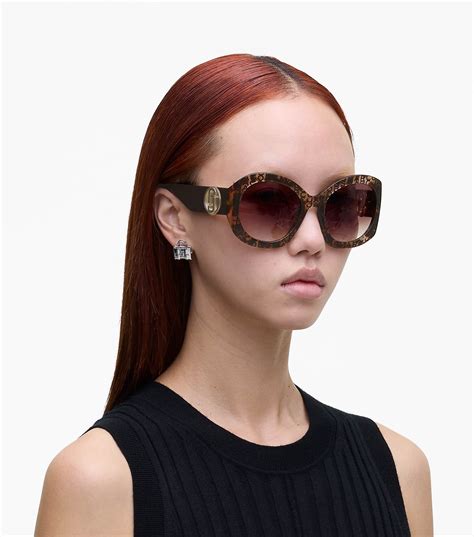 The J Marc Monogram Round Sunglasses .